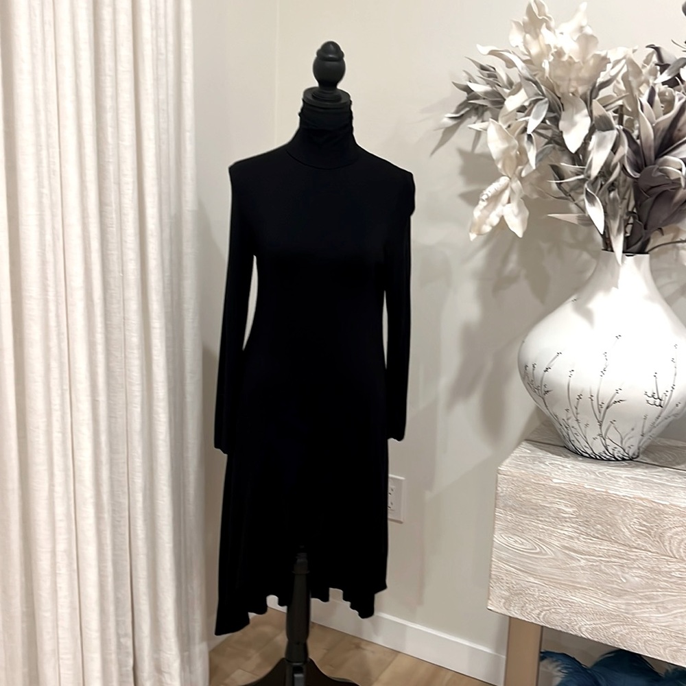 Long sleeve, shorter front longer back, turtleneck, soft fabric